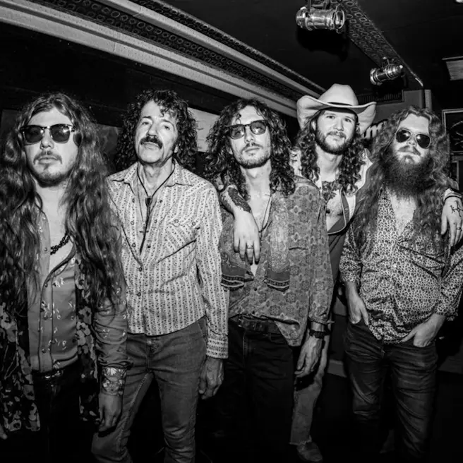 Hippies & Cowboys/Buck