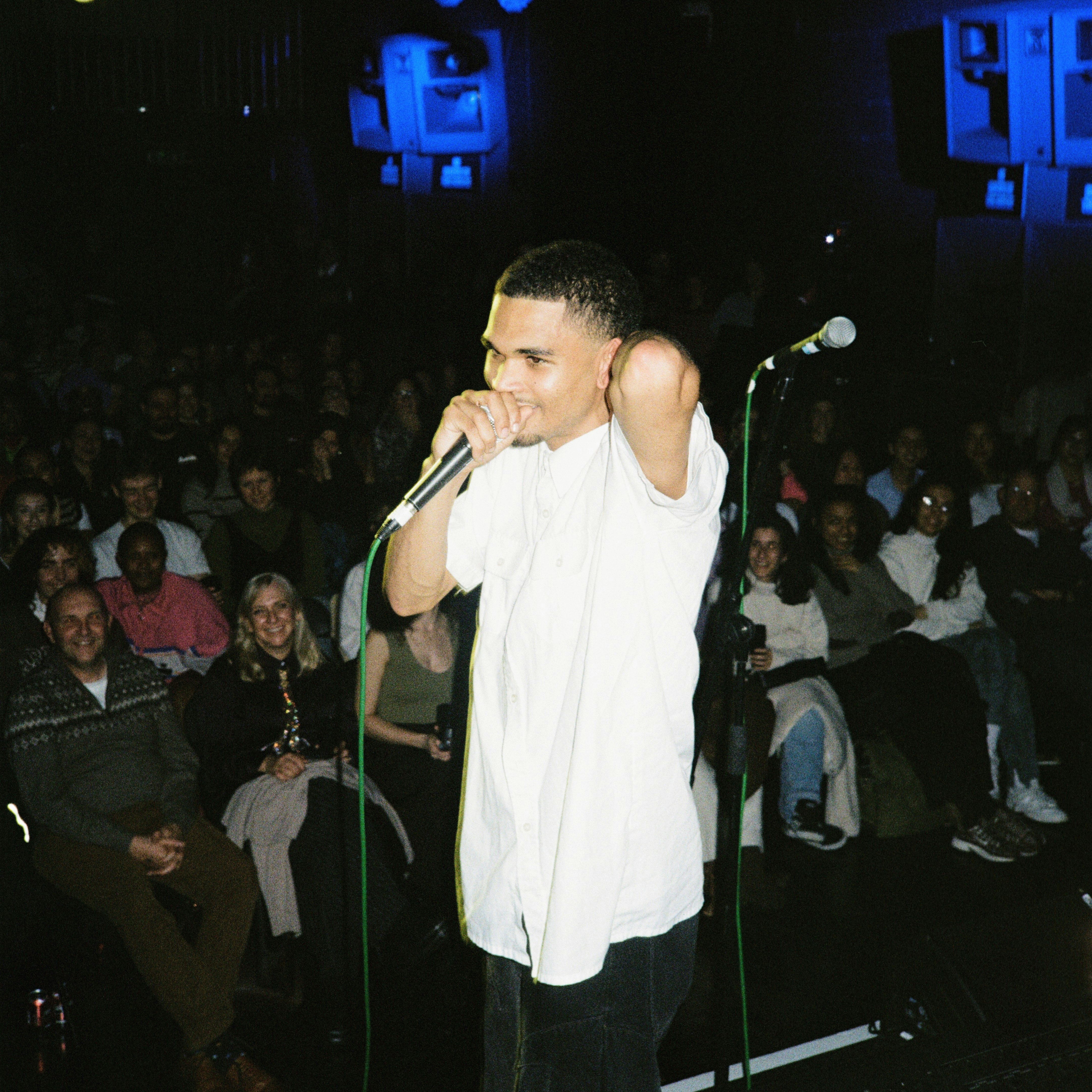 SpitNights | poets v singers