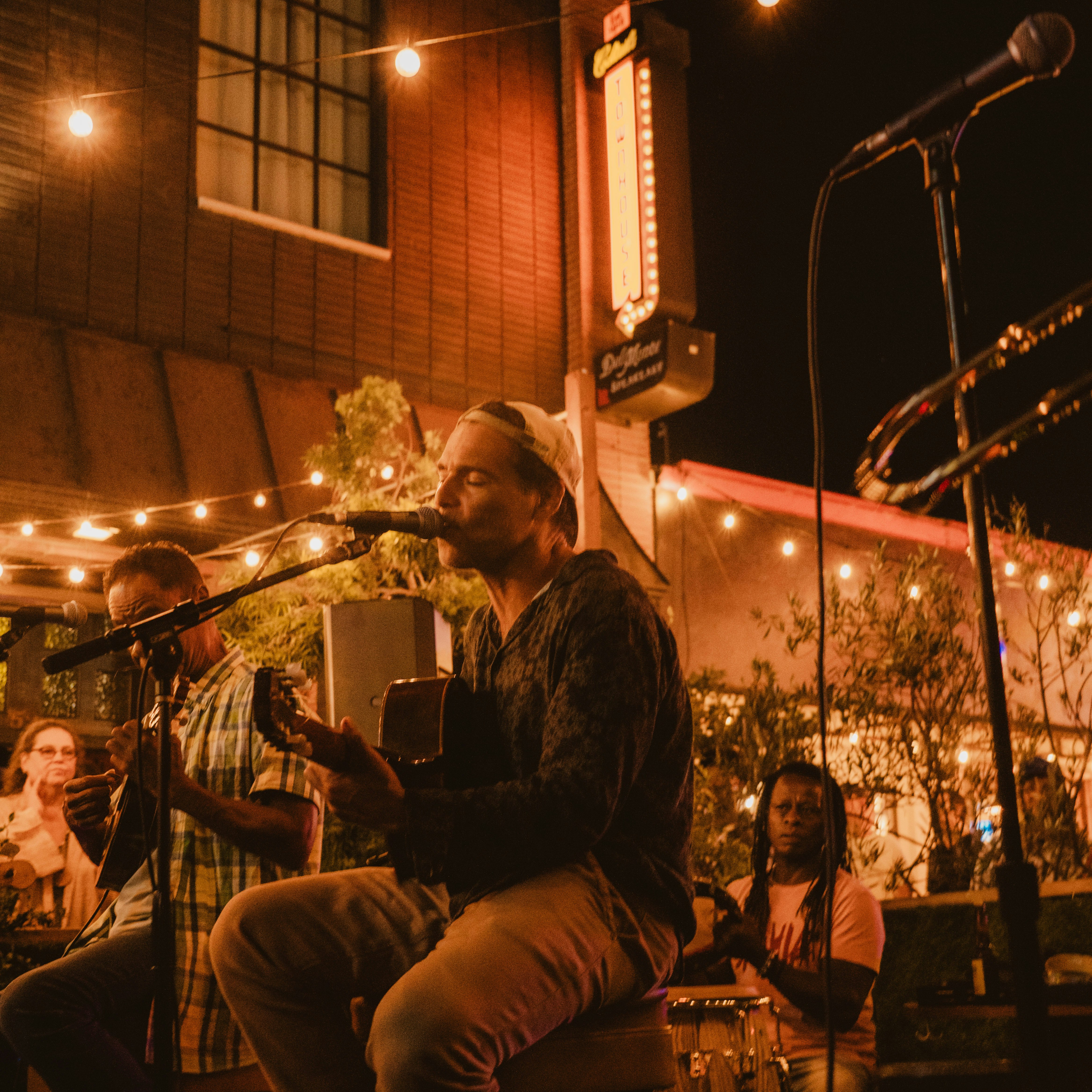 Photo of Rogê Samba do Balde (patio show at sunset)