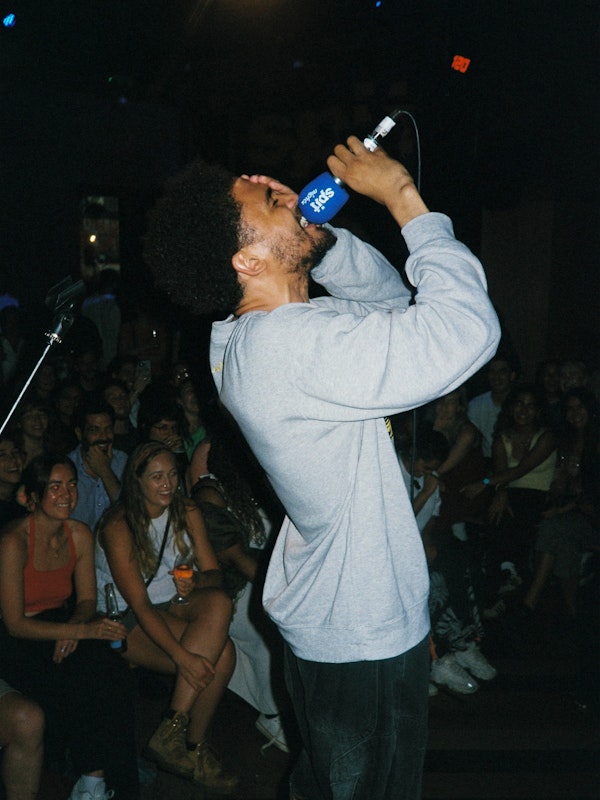 SpitNights | poets v singers
